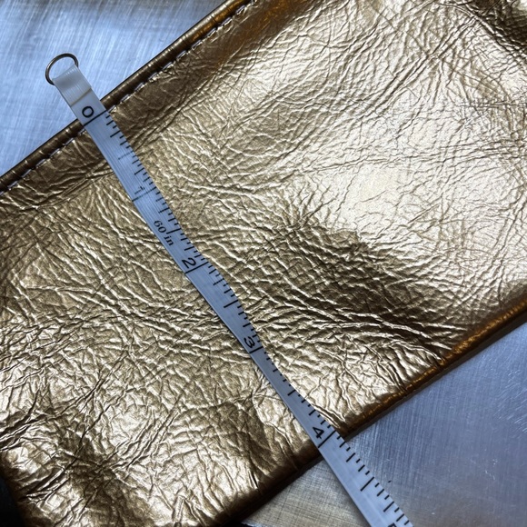 Chic Metallic Soft Gold Leather Bag with Zipper Closure adding a Touch of Glam - Picture 9 of 11